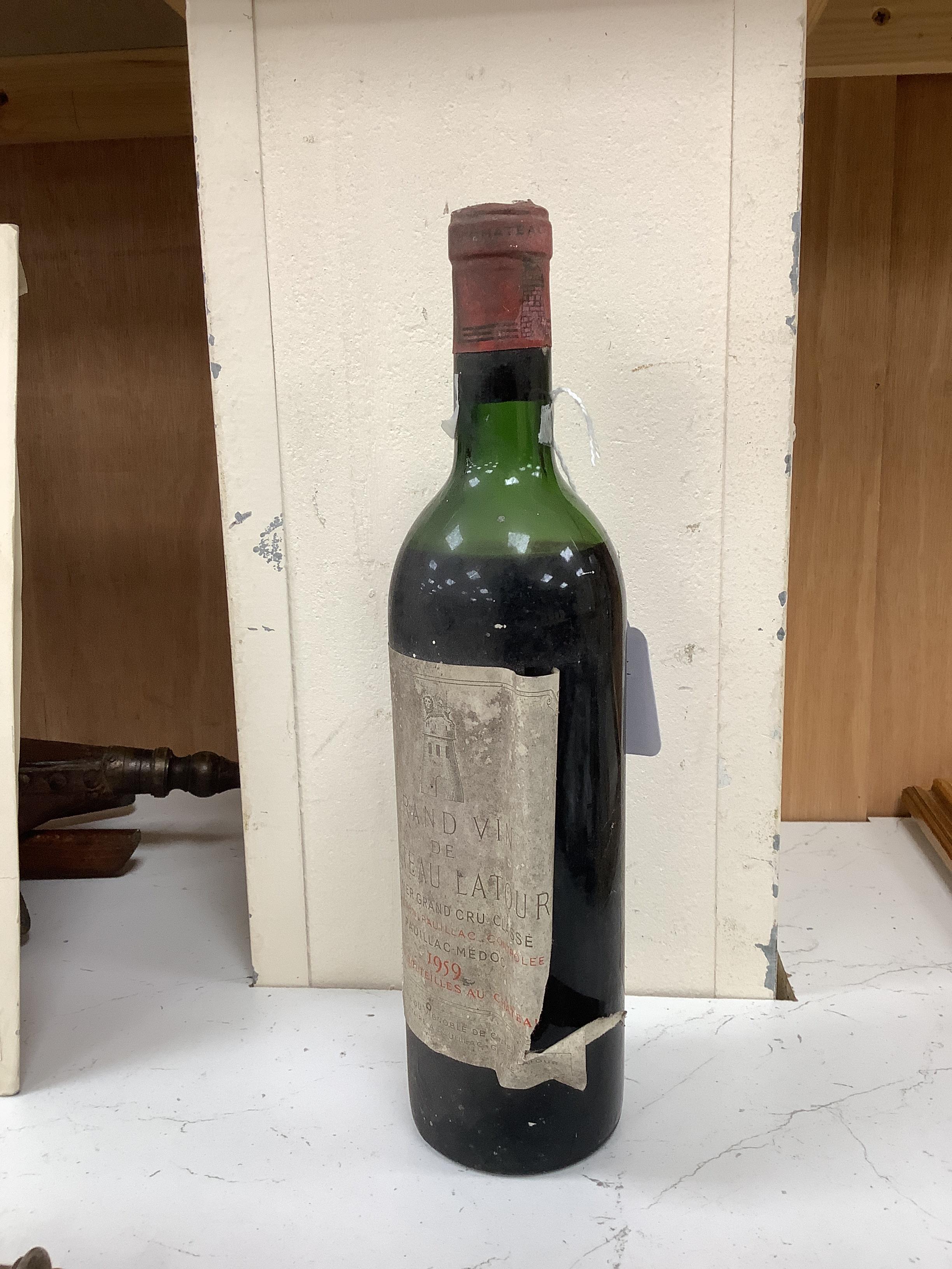 One bottle of 1959 Chateau Latour wine, label damaged